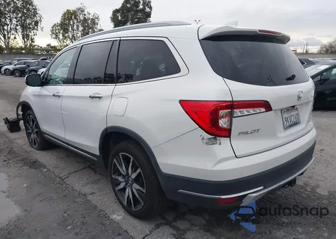 2021 Honda Pilot 2Wd Touring 8 Passenger z USA, uszkodzony, nr VIN 5FNYF5H91MB010304